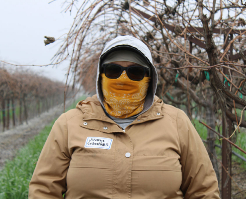 Valley Pruning Contest – California Farmworker Foundation Farmworker smiling during the Central Valley Pruning Contest held by California Farmworker Foundation