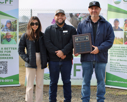 Valley Pruning Contest – California Farmworker Foundation Farmworker smiling during the Central Valley Pruning Contest held by California Farmworker Foundation